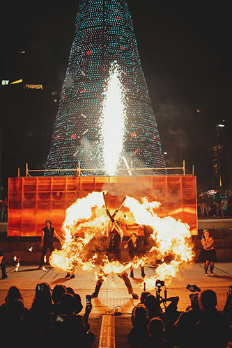 Performer Felicity Boyd of Motus Collective. Fire performance at EMPYRE Fire Festival 2022, event by Dragon Mill, Victoria Square, Adelaide, photo by Castleforge Photography