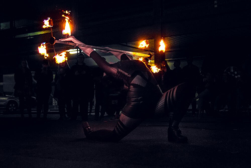 Nyx's Hot Dragonstaff Fire Entertainment at The Market Shed on Holland Fire Performance, Fire Dancing at Twilight market Suzanne Elliot Photography