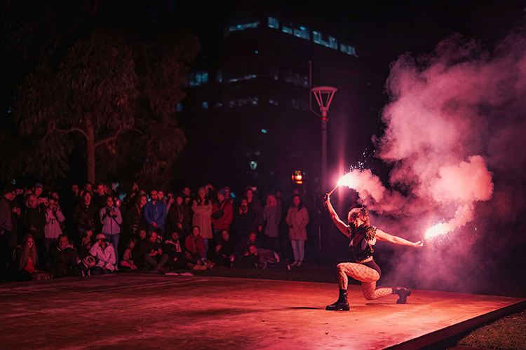Performer Felicity Boyd of Motus Collective. Fire performance at UNSEEN Winter Solstice Fire Festival 2023, event by Dragon Mill, Light Square and West End, Adelaide, photo by TYR.Explorer